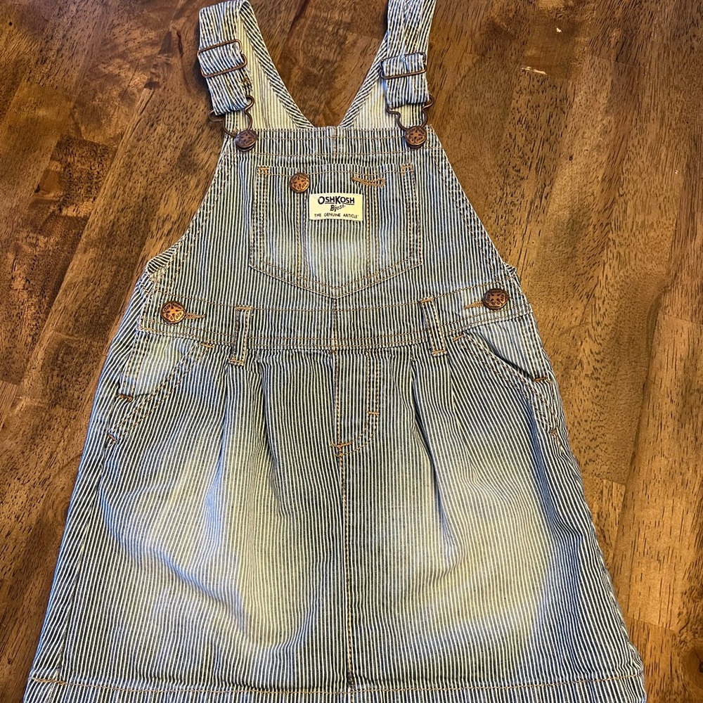 Classic OshKosh pinstripe overall dress. Size 4T